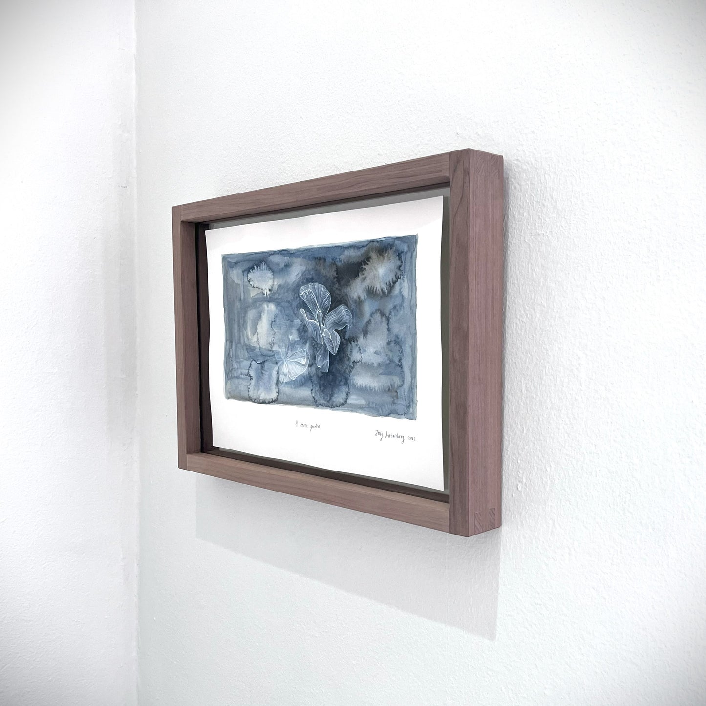 Side view of framed painting, A secret garden.